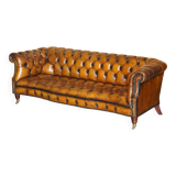 Vintage Chesterfield serpentine luxury sofa in restored leather