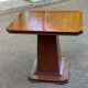 Art Deco dining table in rosewood from the 1950s with a central leg.
