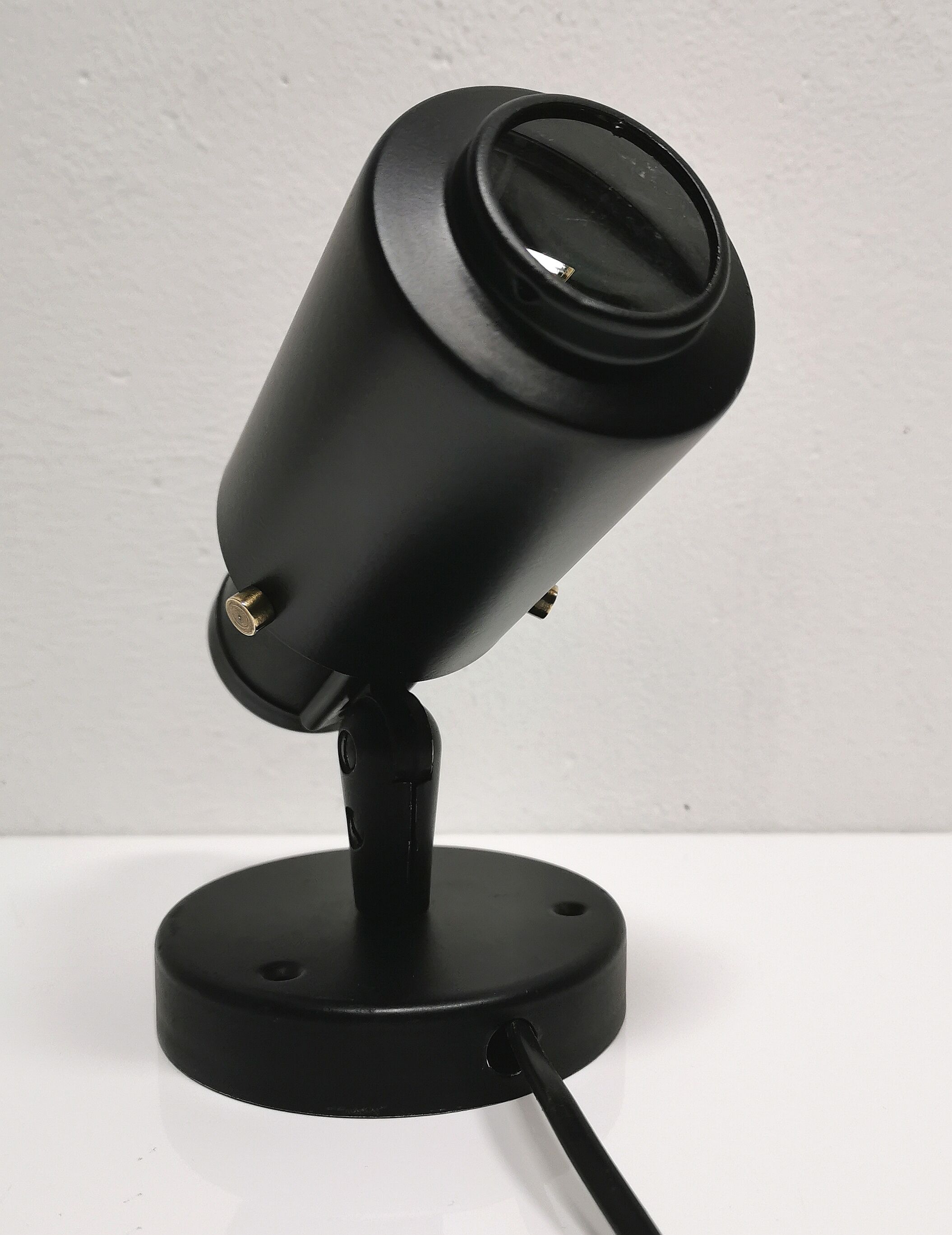 Jacques Biny's black zodiac sconce for Lita