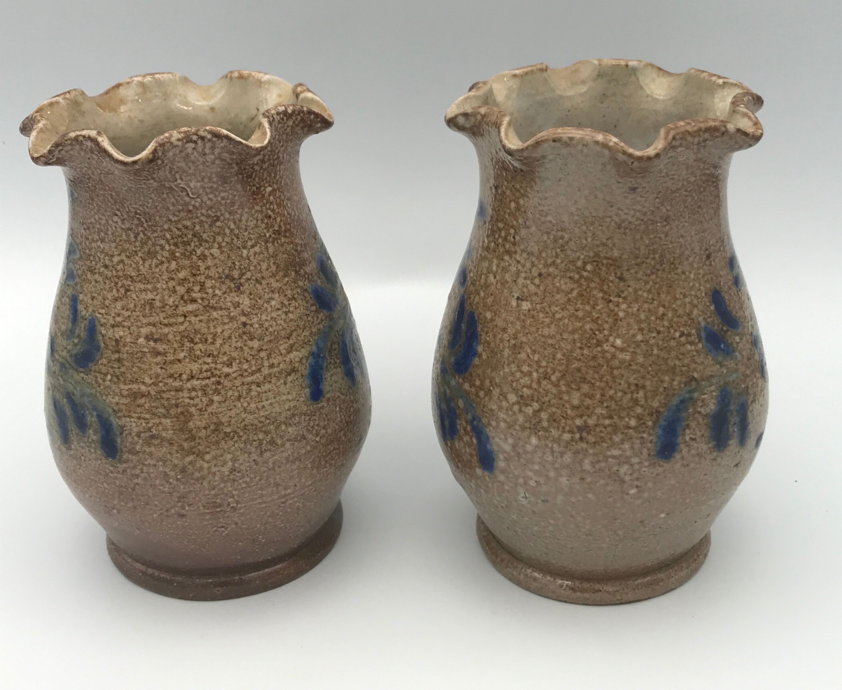 Pair of vintage pottery vases with floral decoration and glaçureau sel