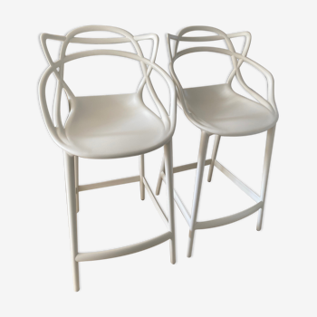 Masters white stools by Philippe Starck for Kartell