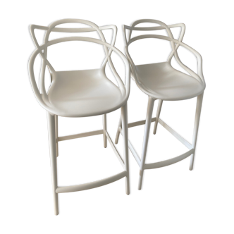 Masters white stools by Philippe Starck for Kartell