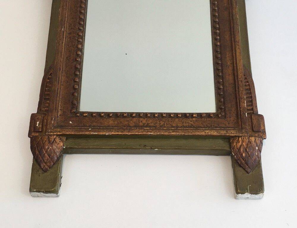Louis XVI style mirror in patinated and gilded wood