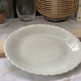white plate with white Limoges pattern