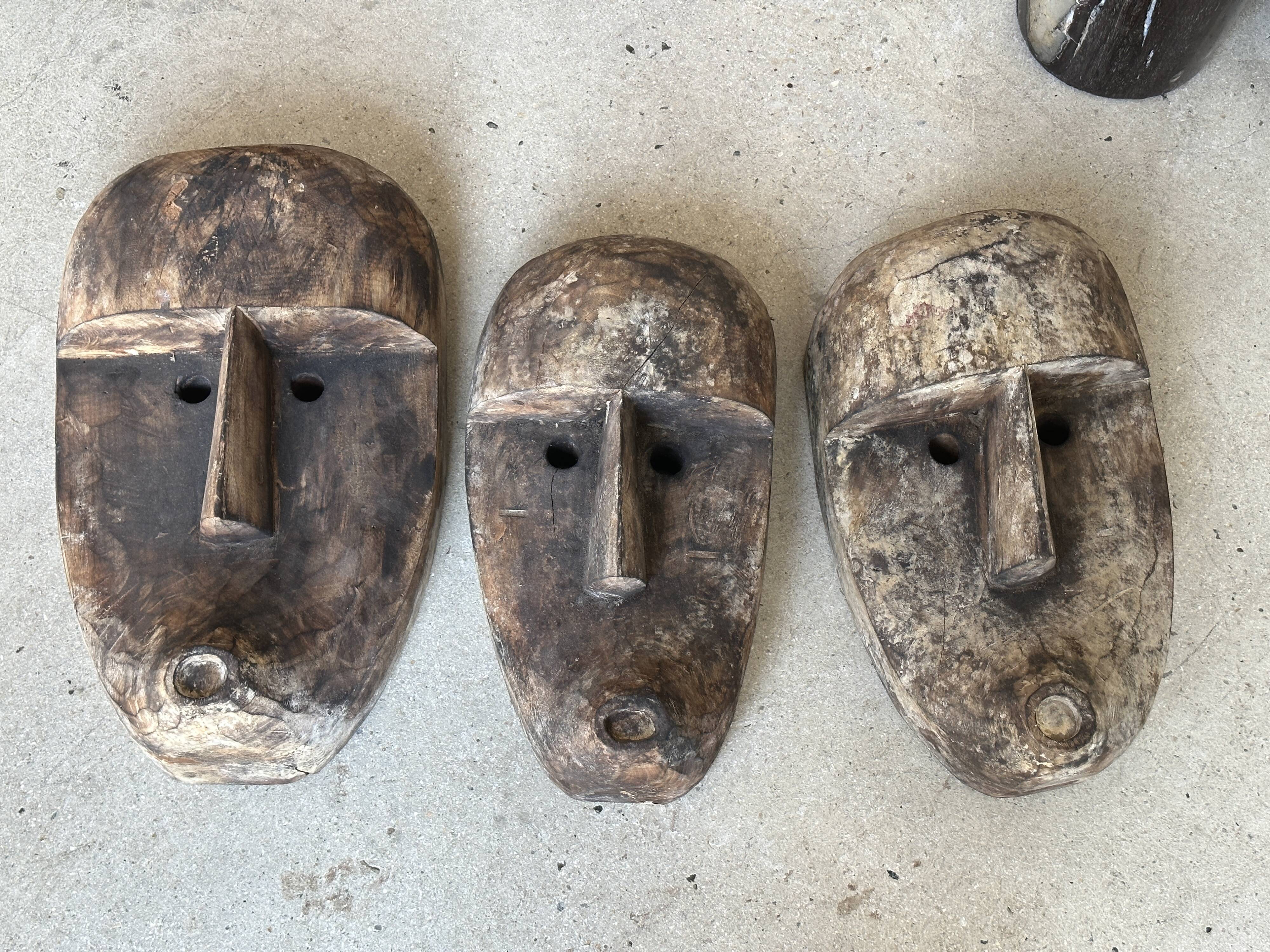 Large Timor mask in patinated wood H:50cm (1)