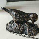Door knocker/knocker. Woodpecker on tree trunk. In cast iron with a golden patina