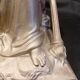 Statuette of a woman in gilded cast iron (Joan of Arc?)