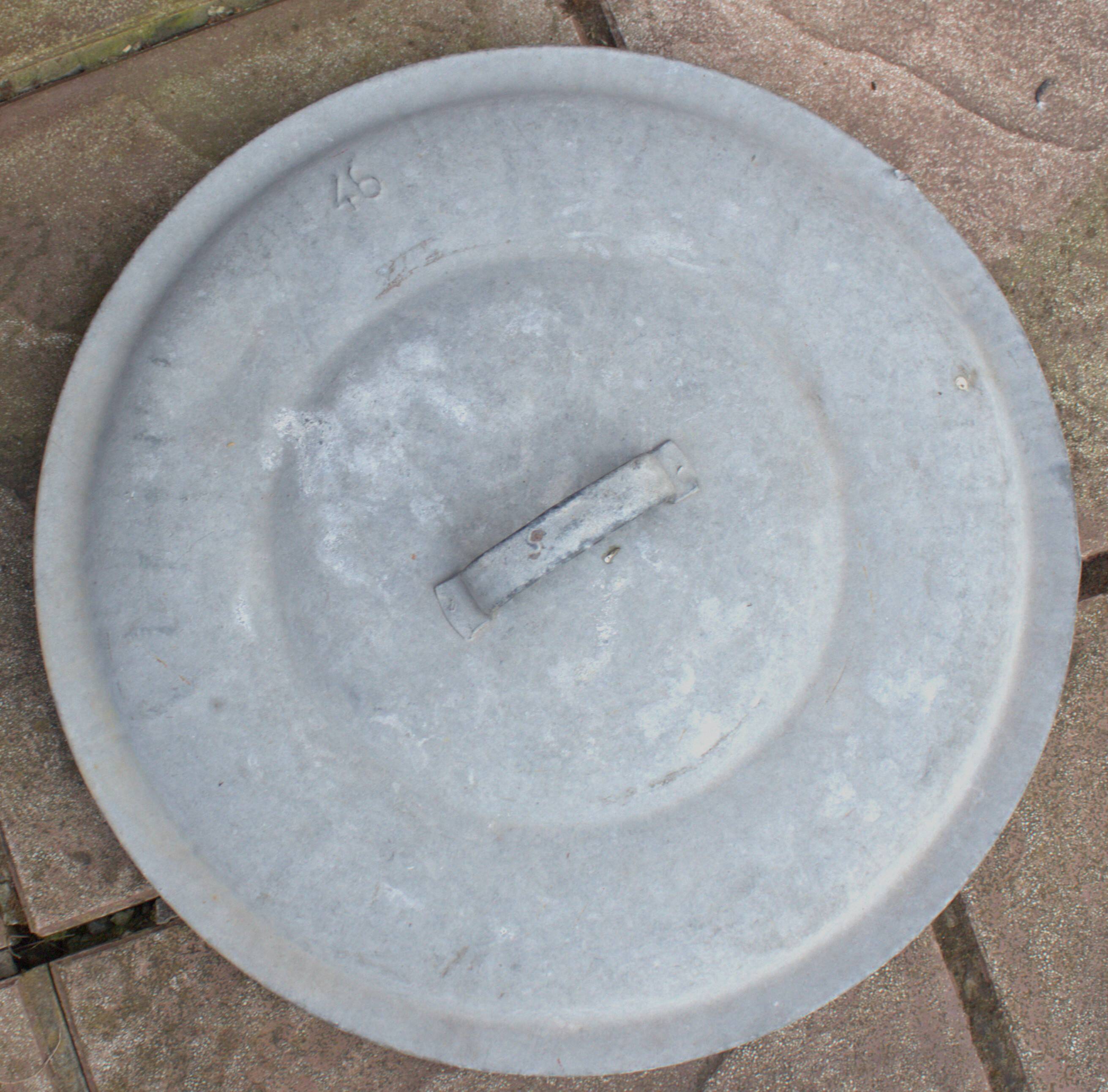 Old galvanized zinc trash can with lid