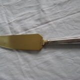 silver metal knife and cake shovel