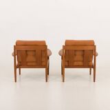 Rare Grete Jalk teak lounge chairs in aniline cognac leather for Cado