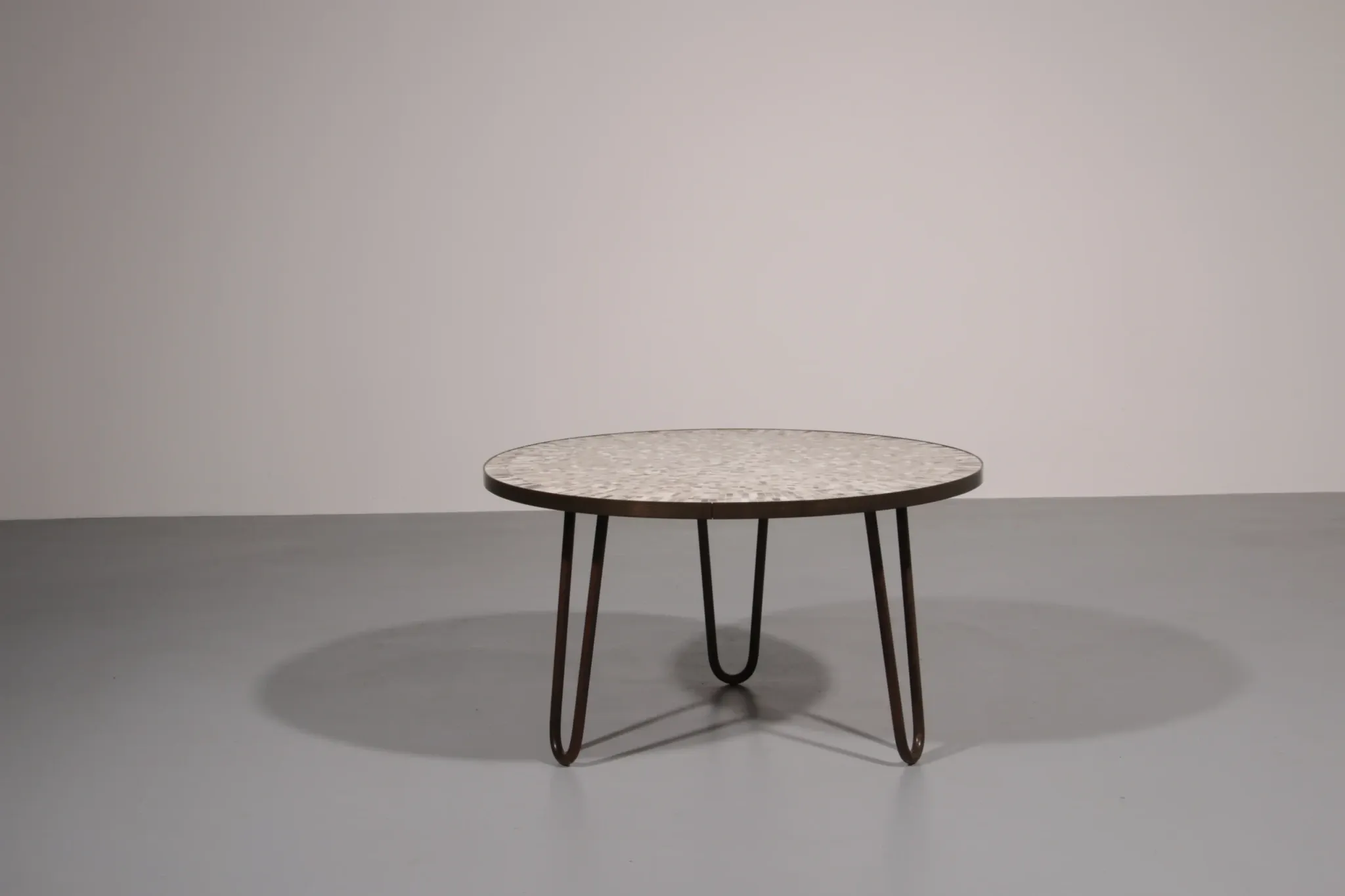 A stunning mosaic coffee table by German sculptor Berthold Müller