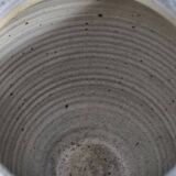 Stoneware vase signed by Sylvie Dufour, incised decoration and relief medallions, 28 cm.