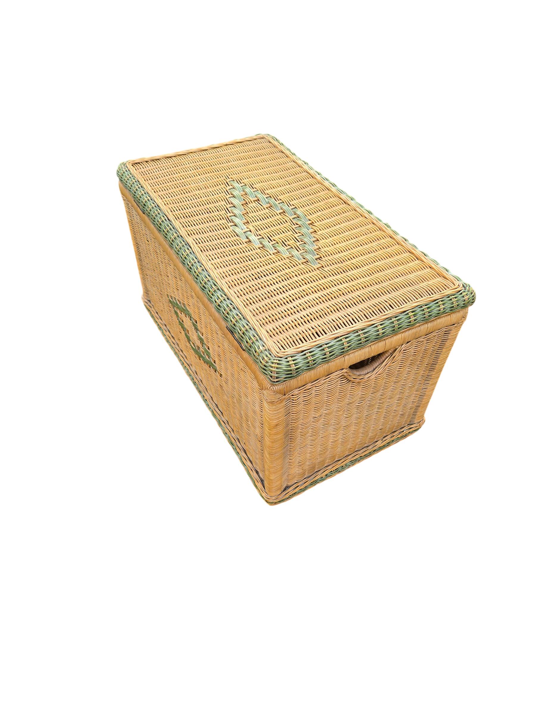 Large vintage wicker chest with green decoration.