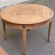 Round extendable dining table stripped in cherry wood with Louis XVI marquetry 1