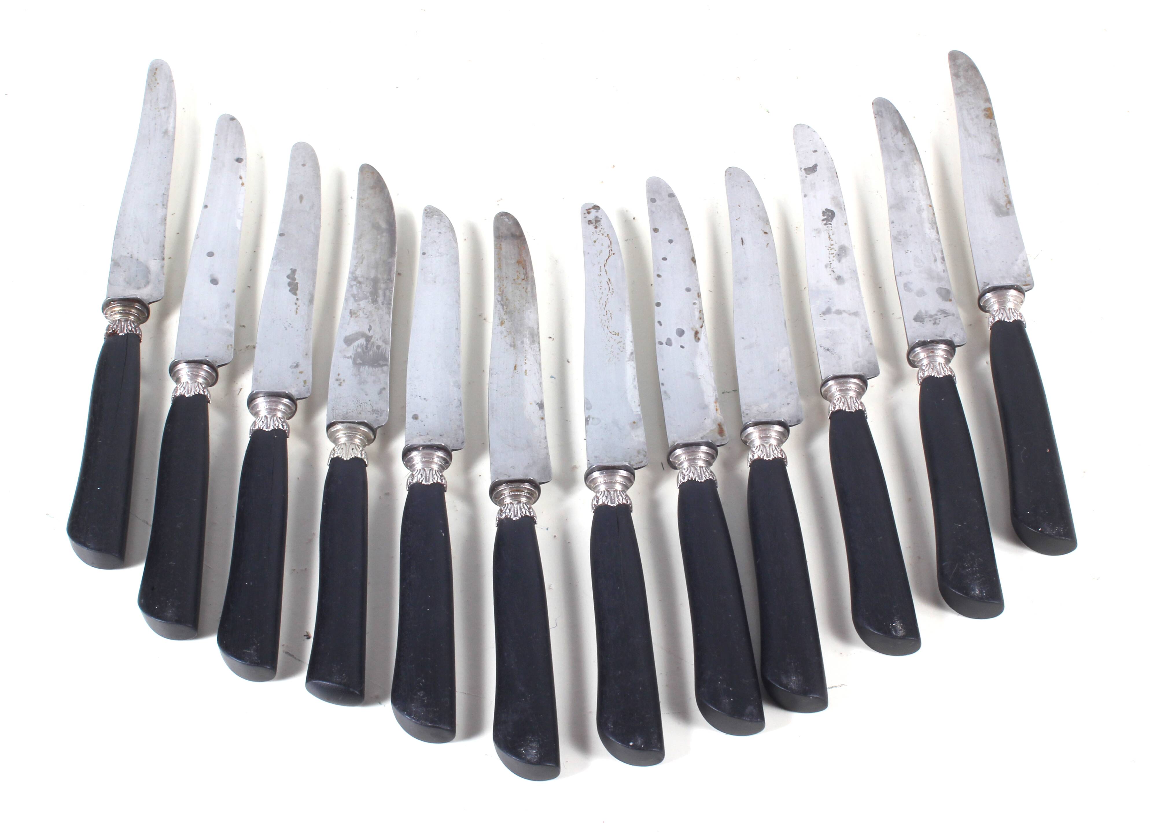 12 antique knives, ebony handle, carbon blade