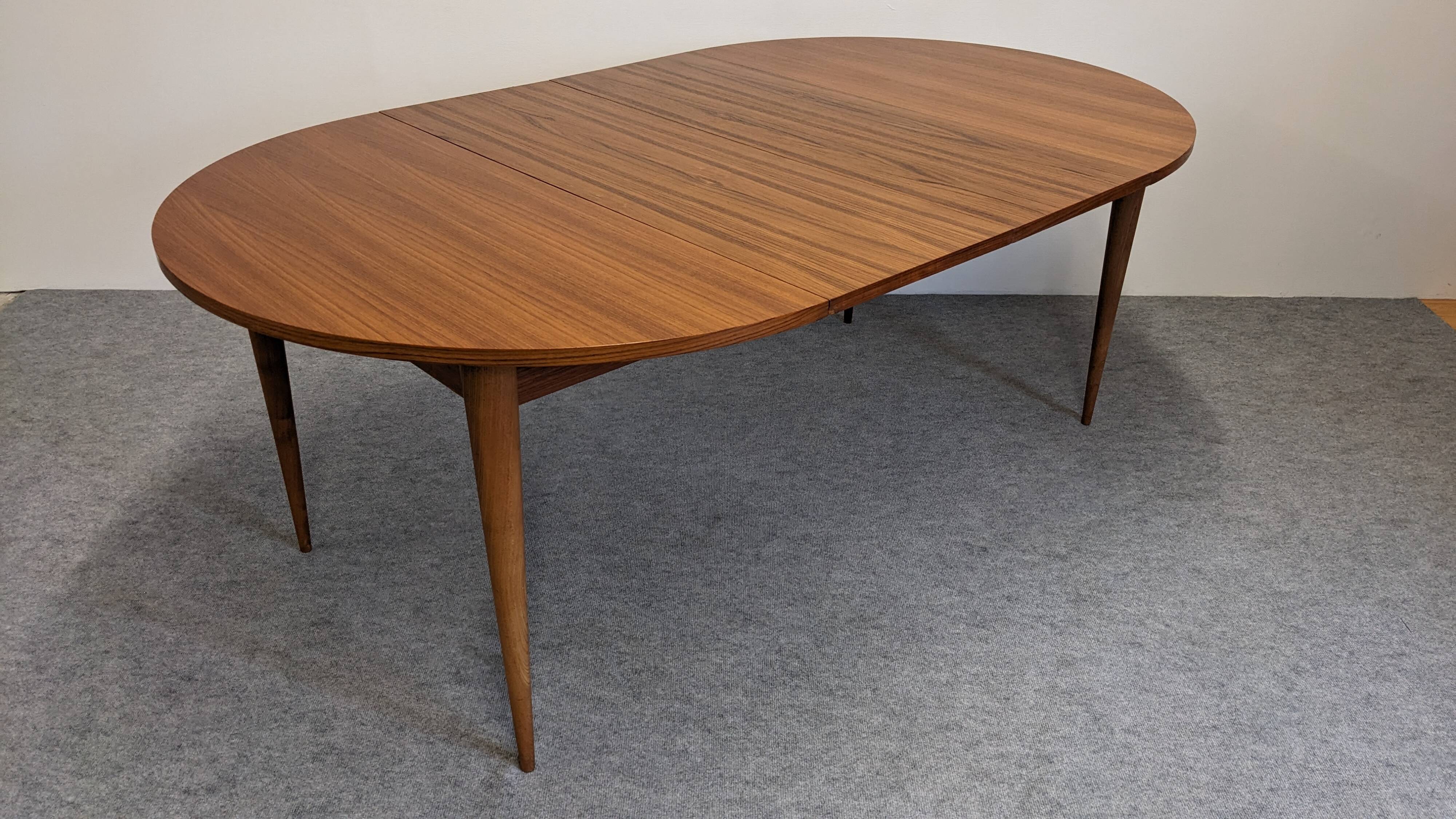 Extendable round table in Scandinavian style made of teak, France circa 1960.