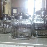 three large glass jars