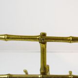 Bamboo-like coat rack in bronze