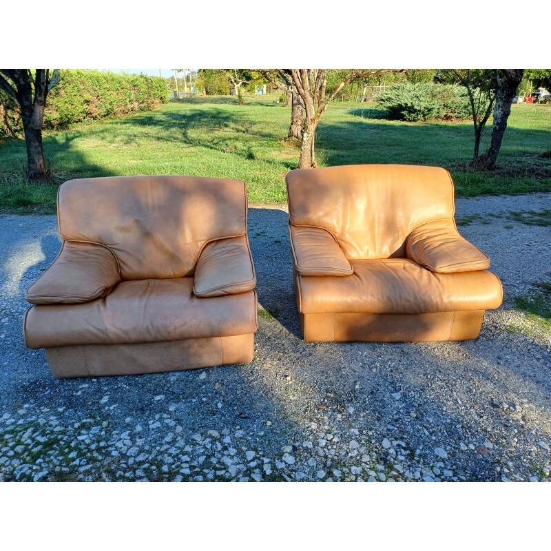 Paire de fauteuils vintage en skaï marron clair