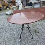 Round marble table with wrought iron base from the mid-20th century.