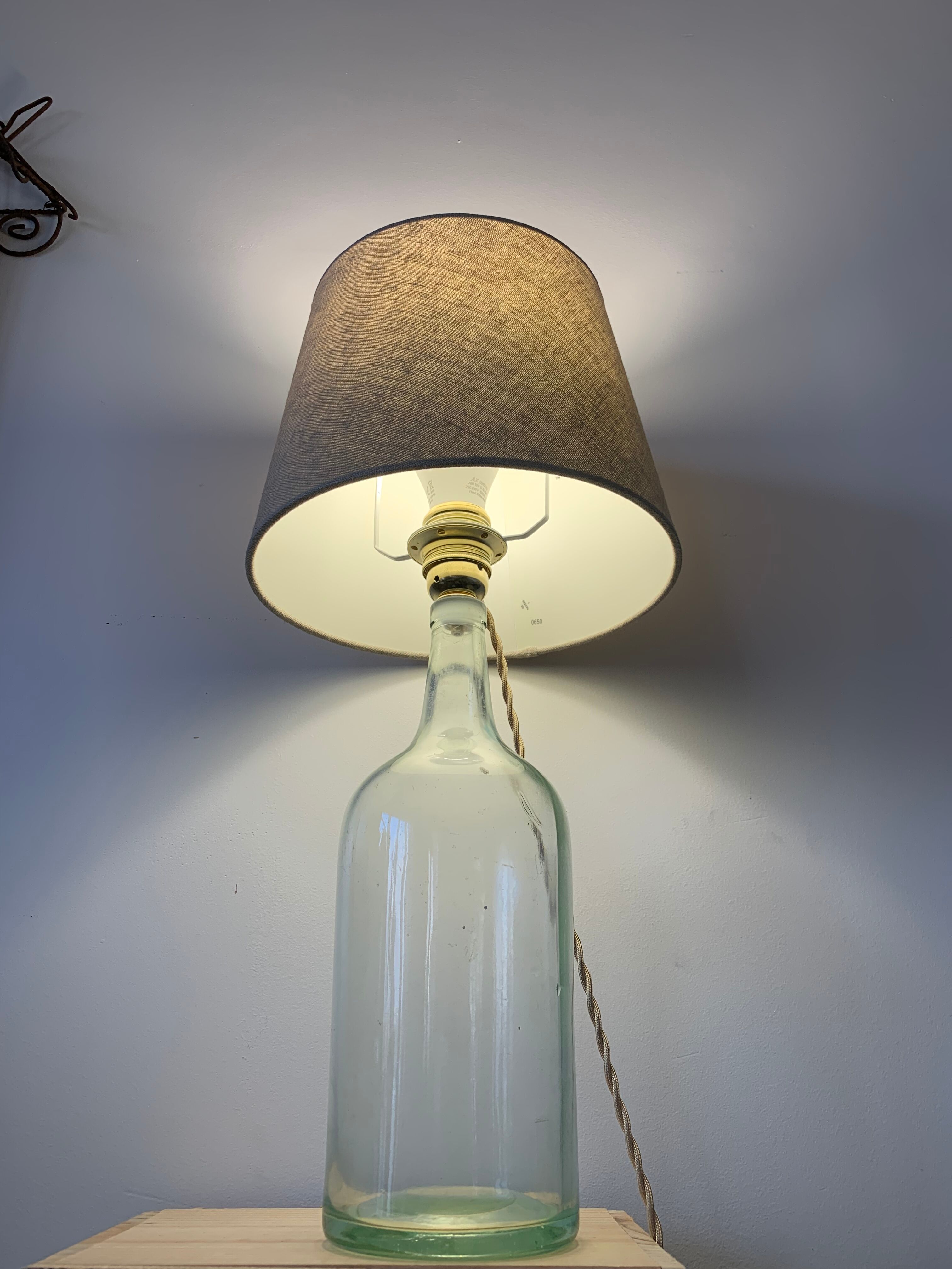 Old demijohn lamp