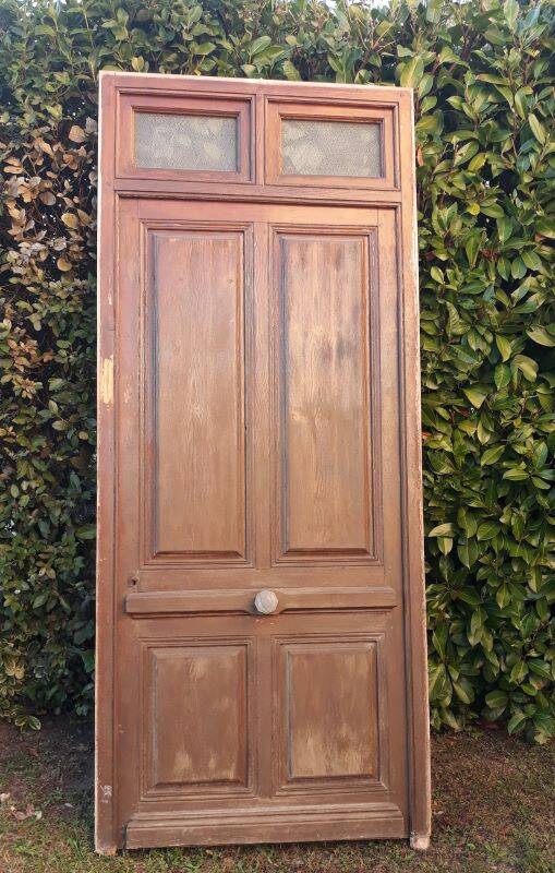 Front door and its frame, translucent glass windows, early 20th century