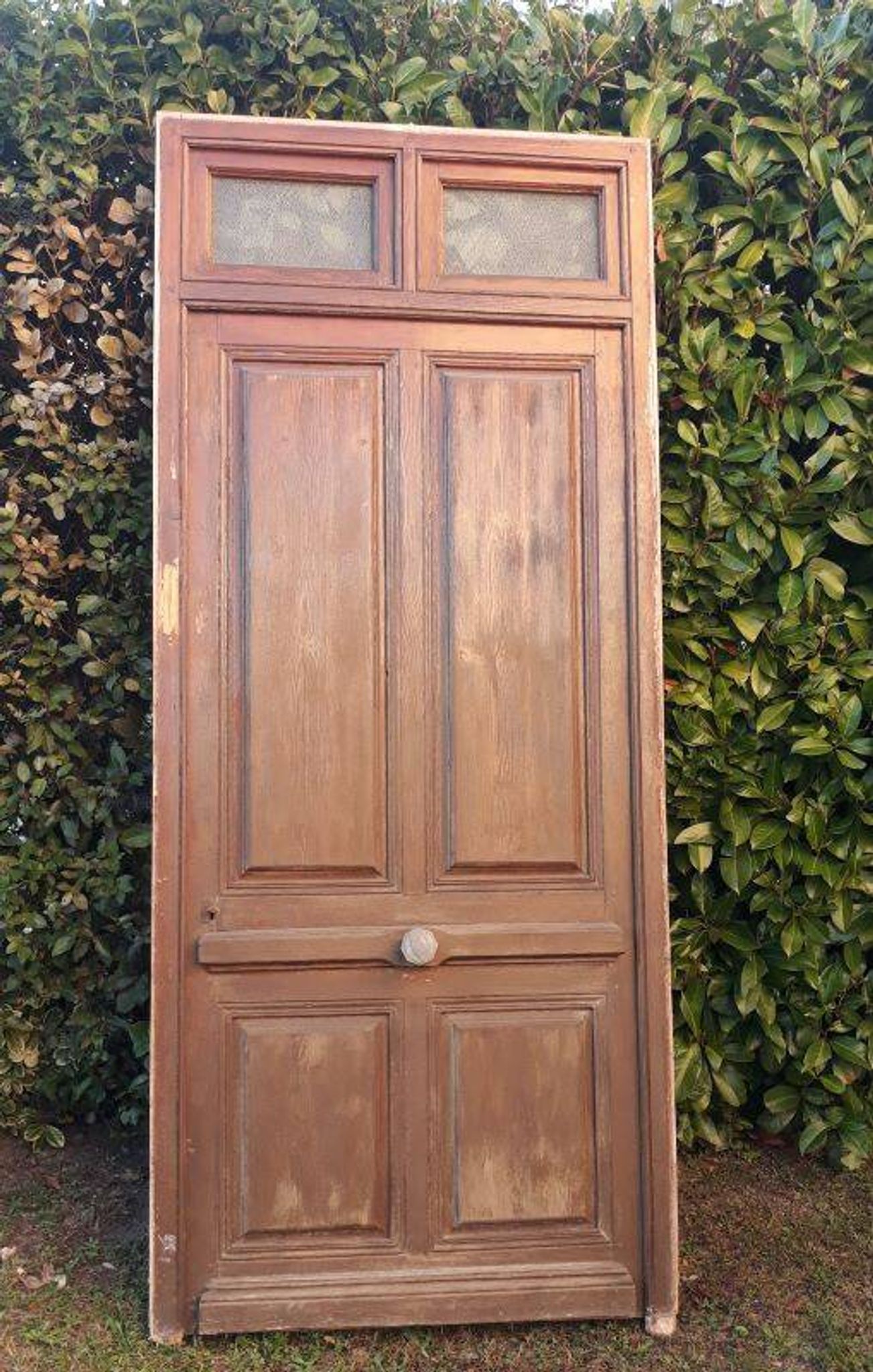 Porte d'entrée et son cadre imposte en verre translucide, début XXème