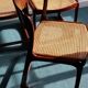Suite de 6 chaises traineau Baumann cannées vintage