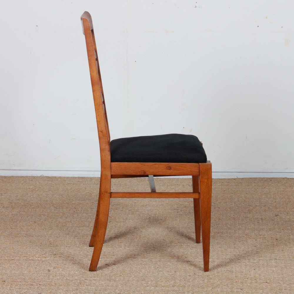 Set of 4 solid oak chairs from the 1950s.