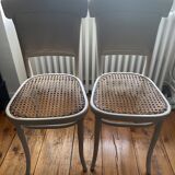 1 banquette cannée, 2 chaises avec accoudoir cannées, 2 chaises cannées