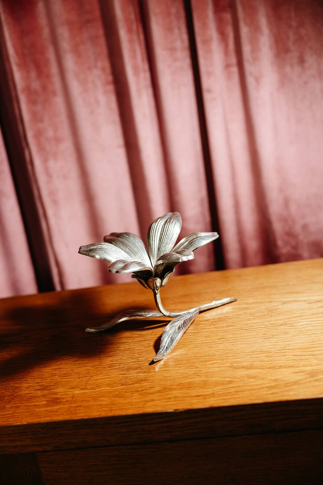Vintage brass flower ashtray with removable petals.
