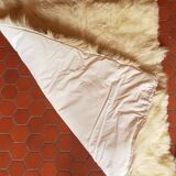 Beige goatskin rug in pair