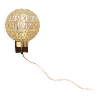 Wall light in rosewood with bobble glass ball shade.