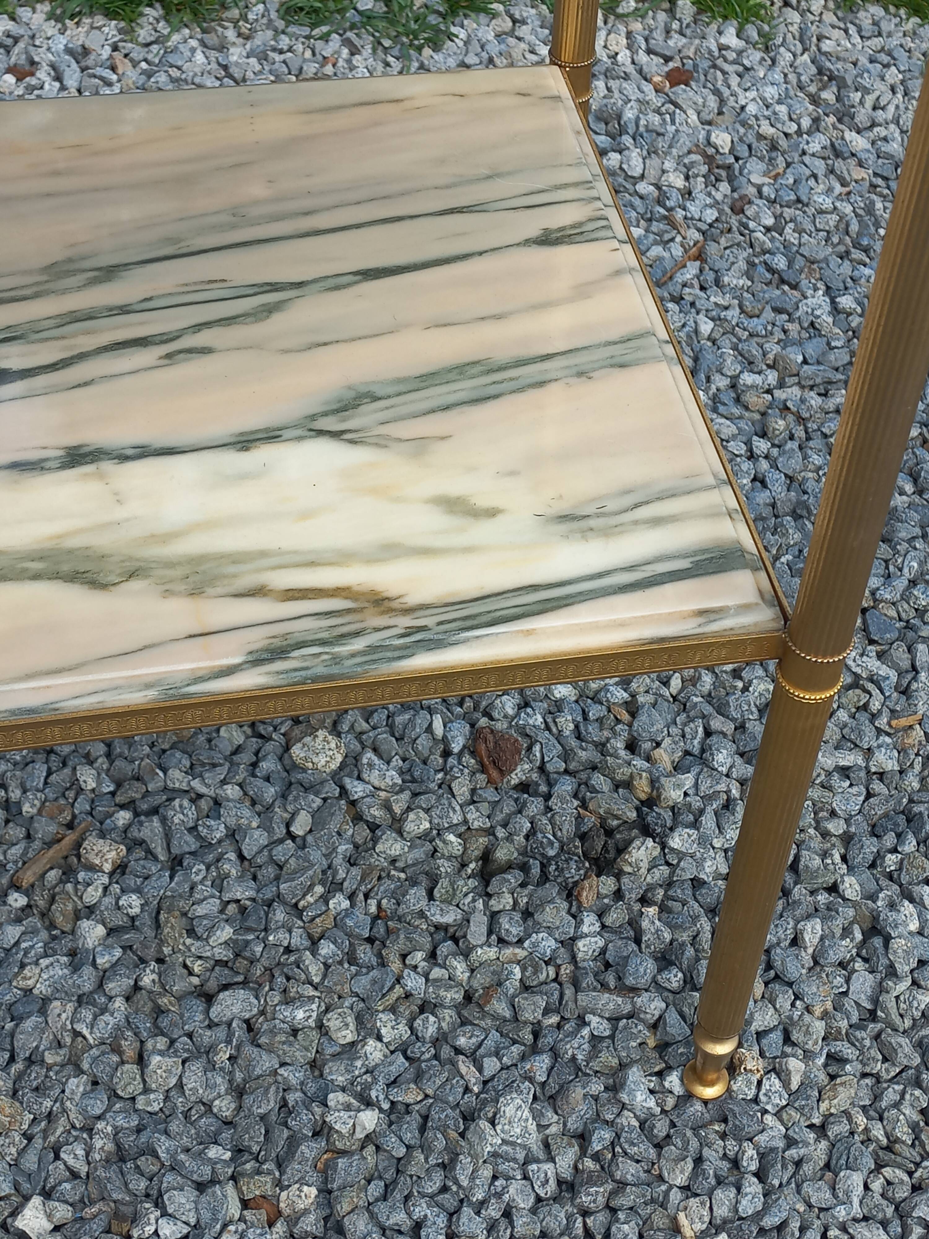 Pair of neoclassical side tables in bronze, brass, marble, and o.