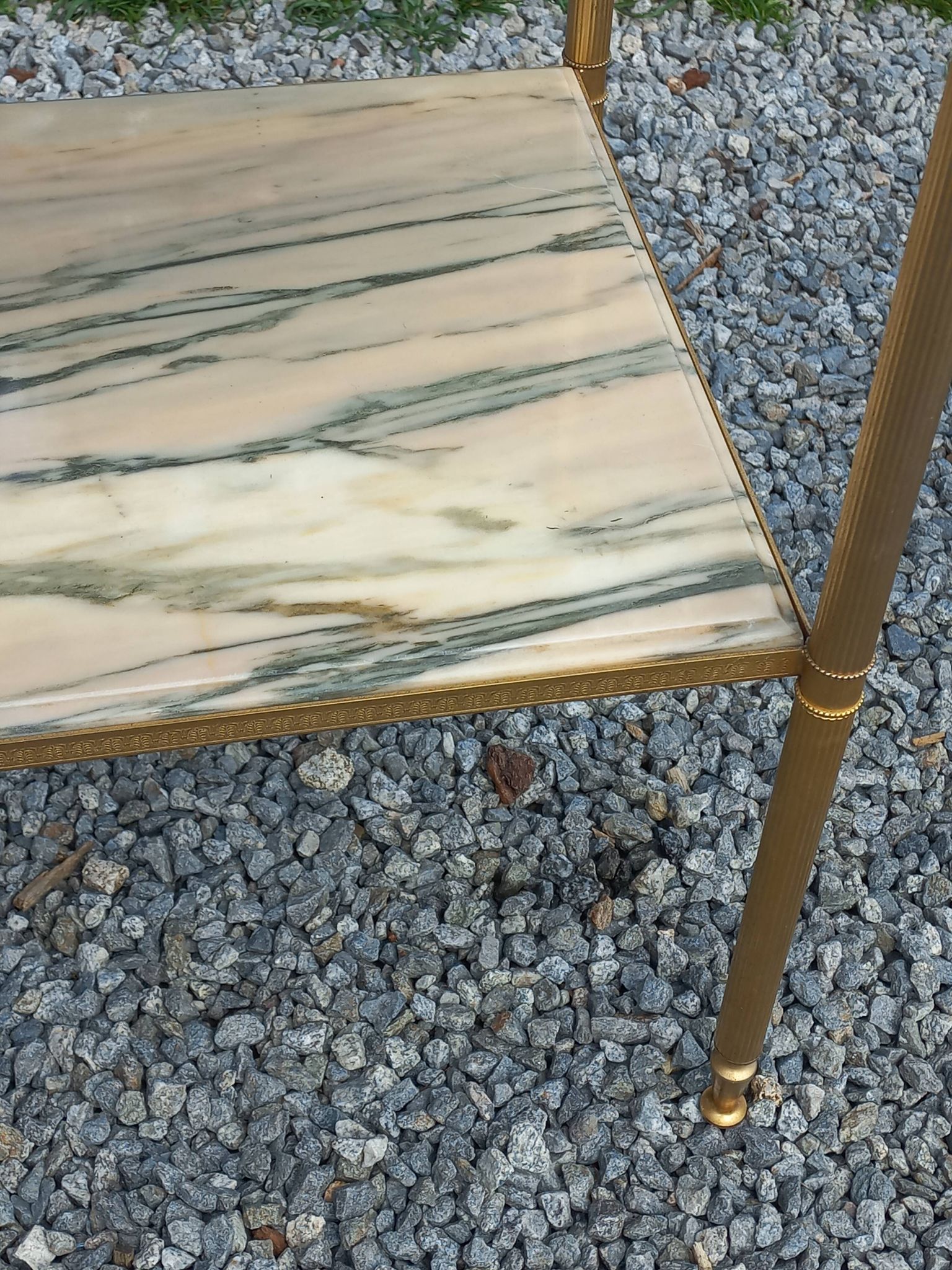 Pair of neoclassical side tables in bronze, brass, marble, and o.