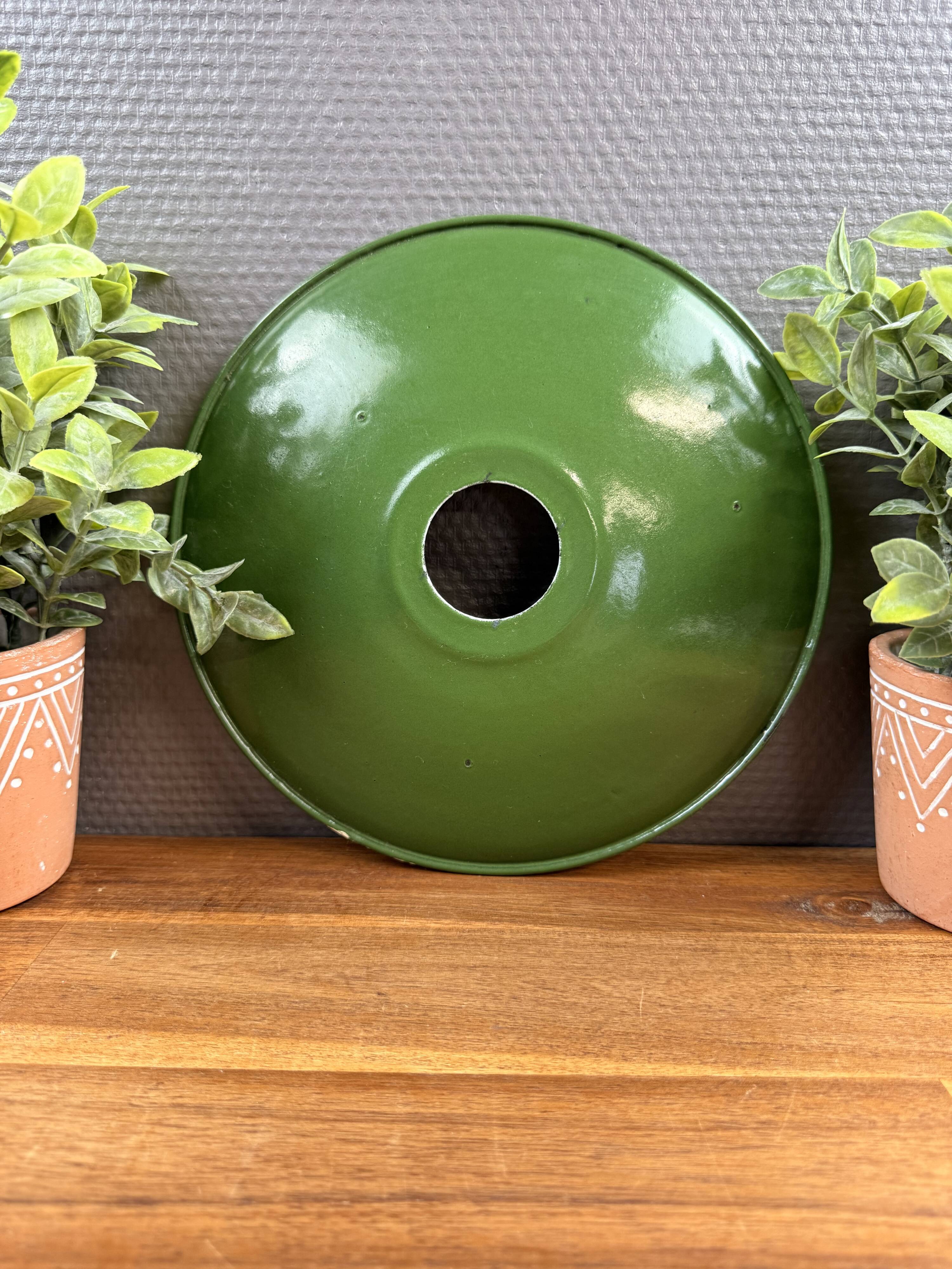 Old industrial workshop lampshade in green enamelled sheet metal.
