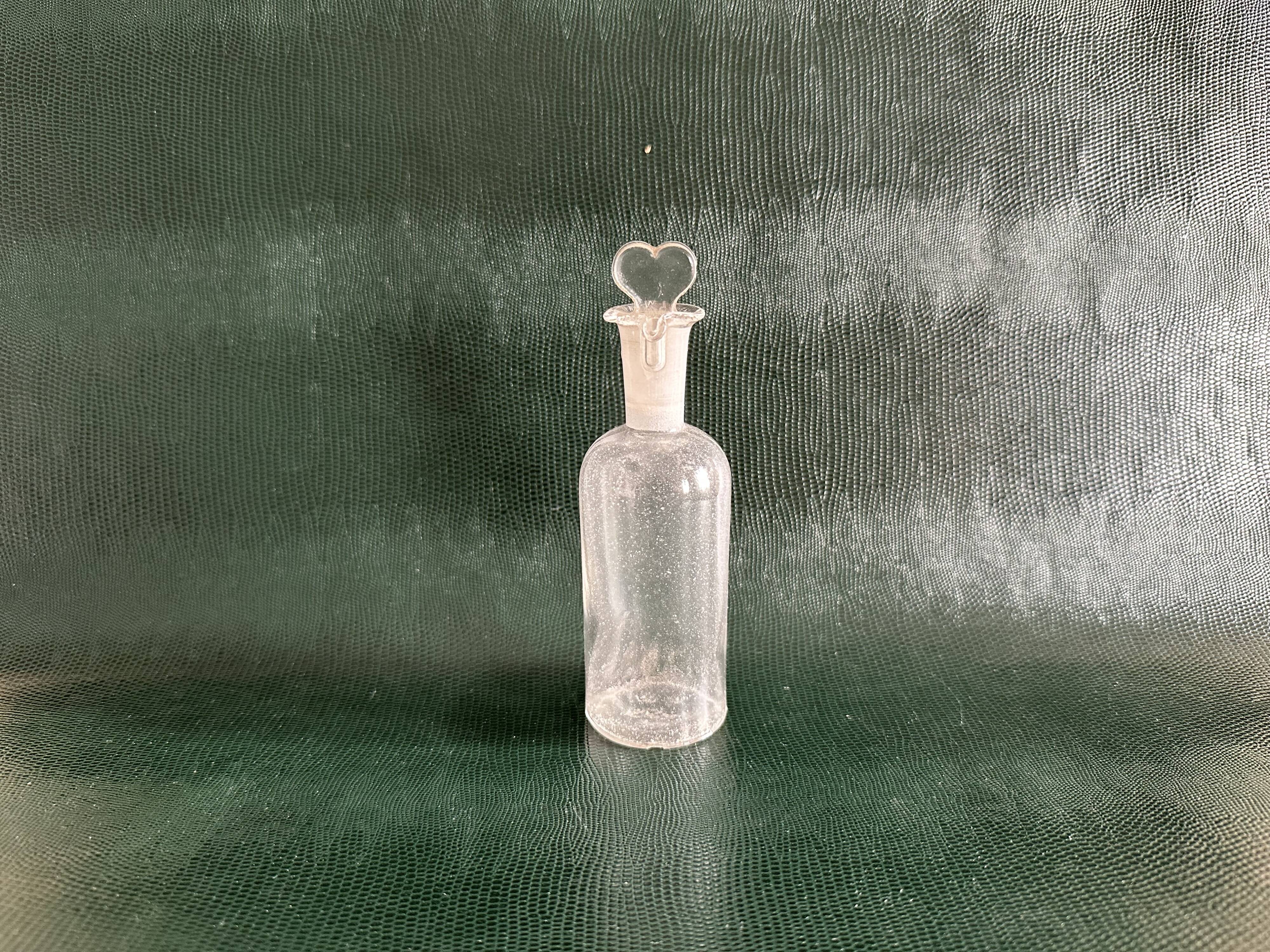 Flacon d’apothicaire ancien en verre, vers 1900