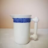 Pitcher with blue frieze