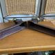 Pair of antique bedside tables in cast iron and brass.