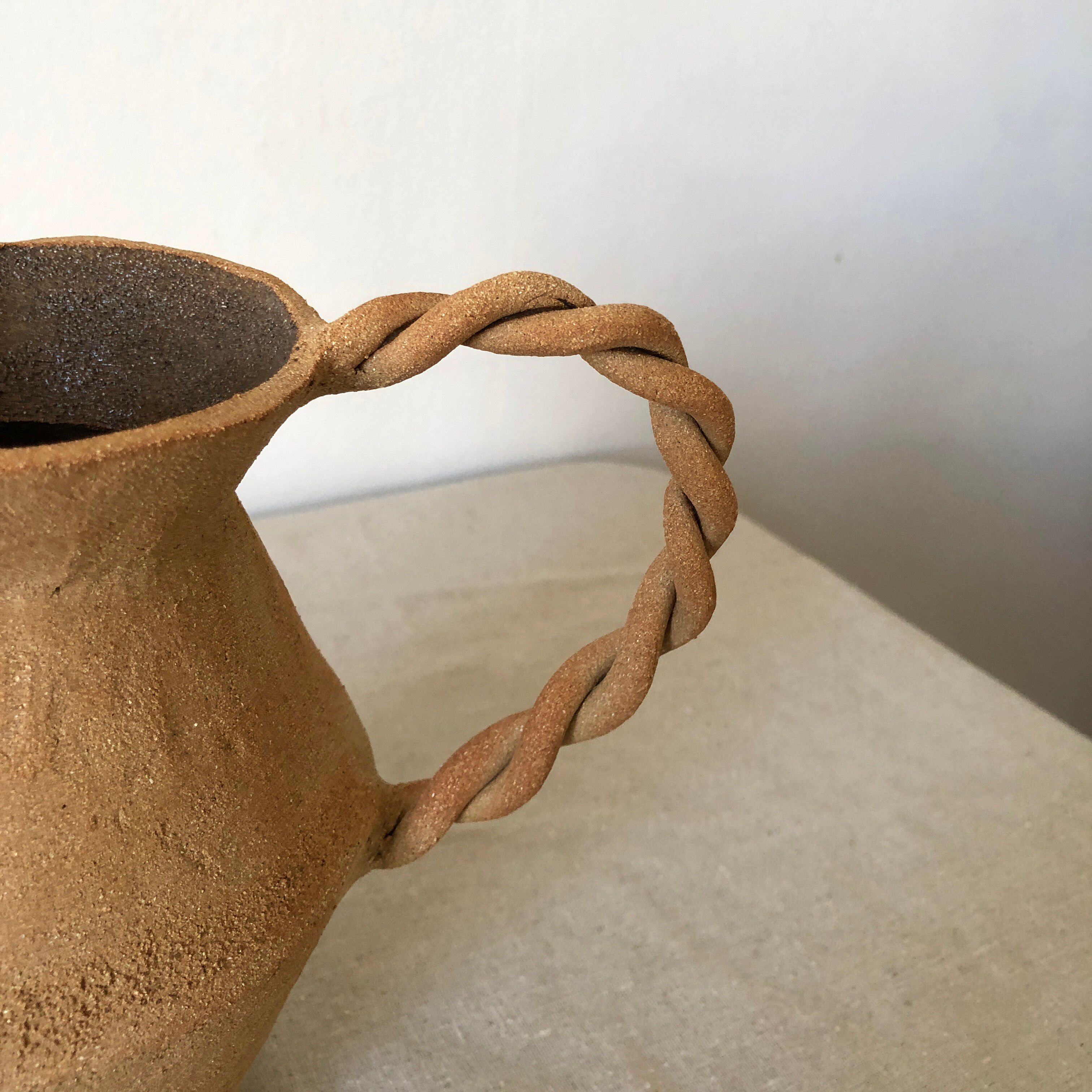 Red sandstone amphora vase