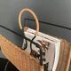 Wicker and lacquered metal magazine holder vintage 1950