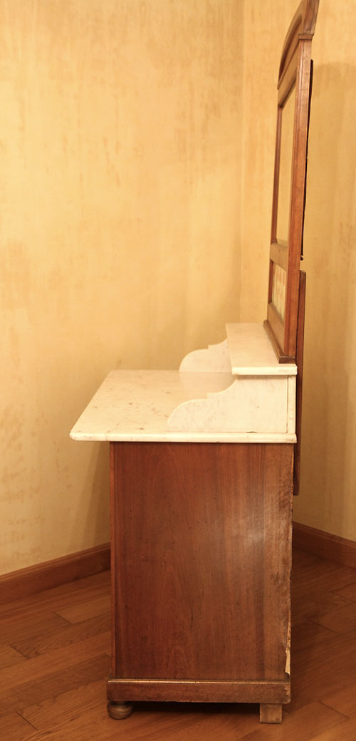 Vintage vanity toilet furniture with marble top.