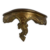 Small baroque-style console in gilded wood.