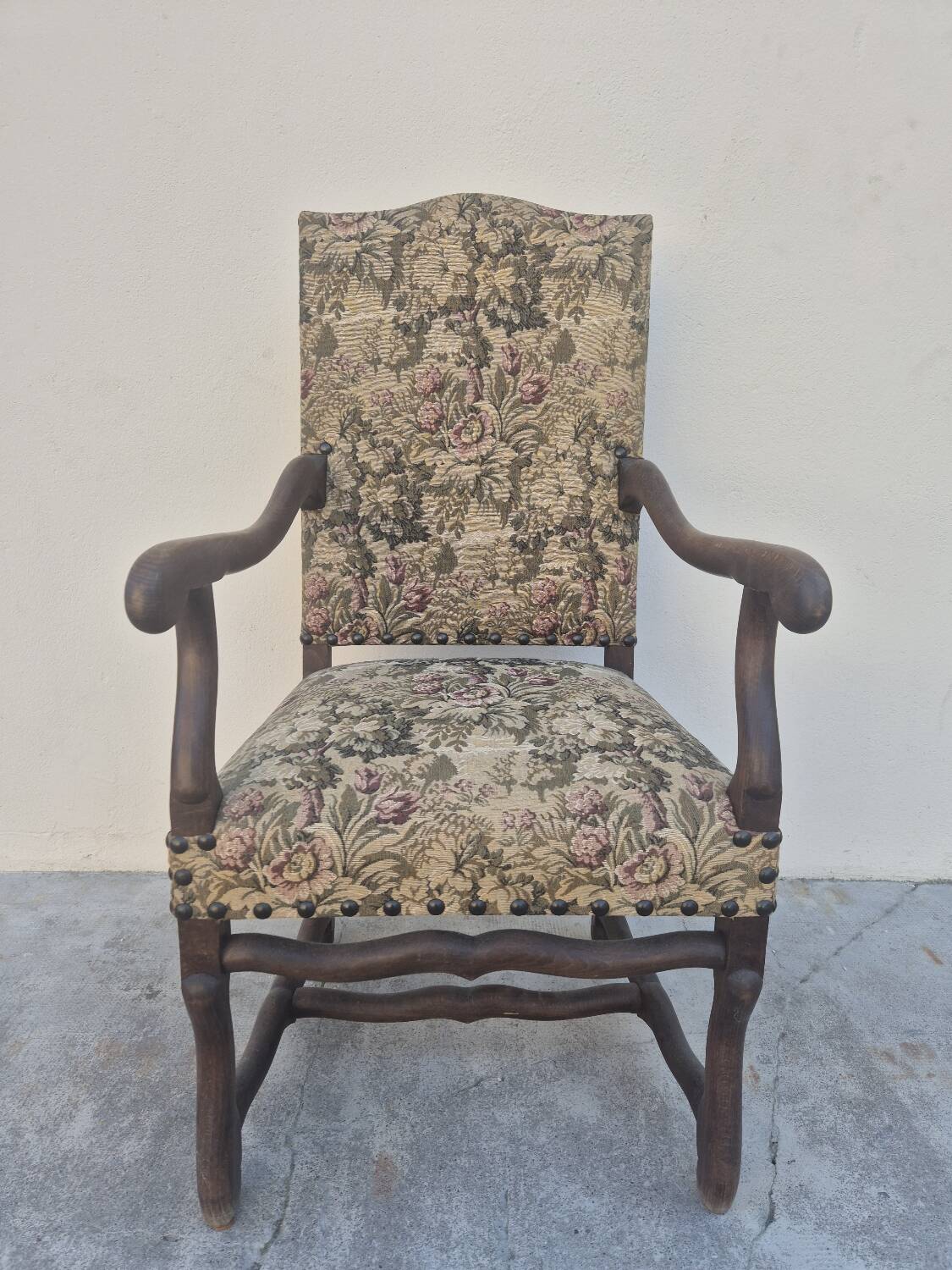 Louis XIII style armchair in walnut
