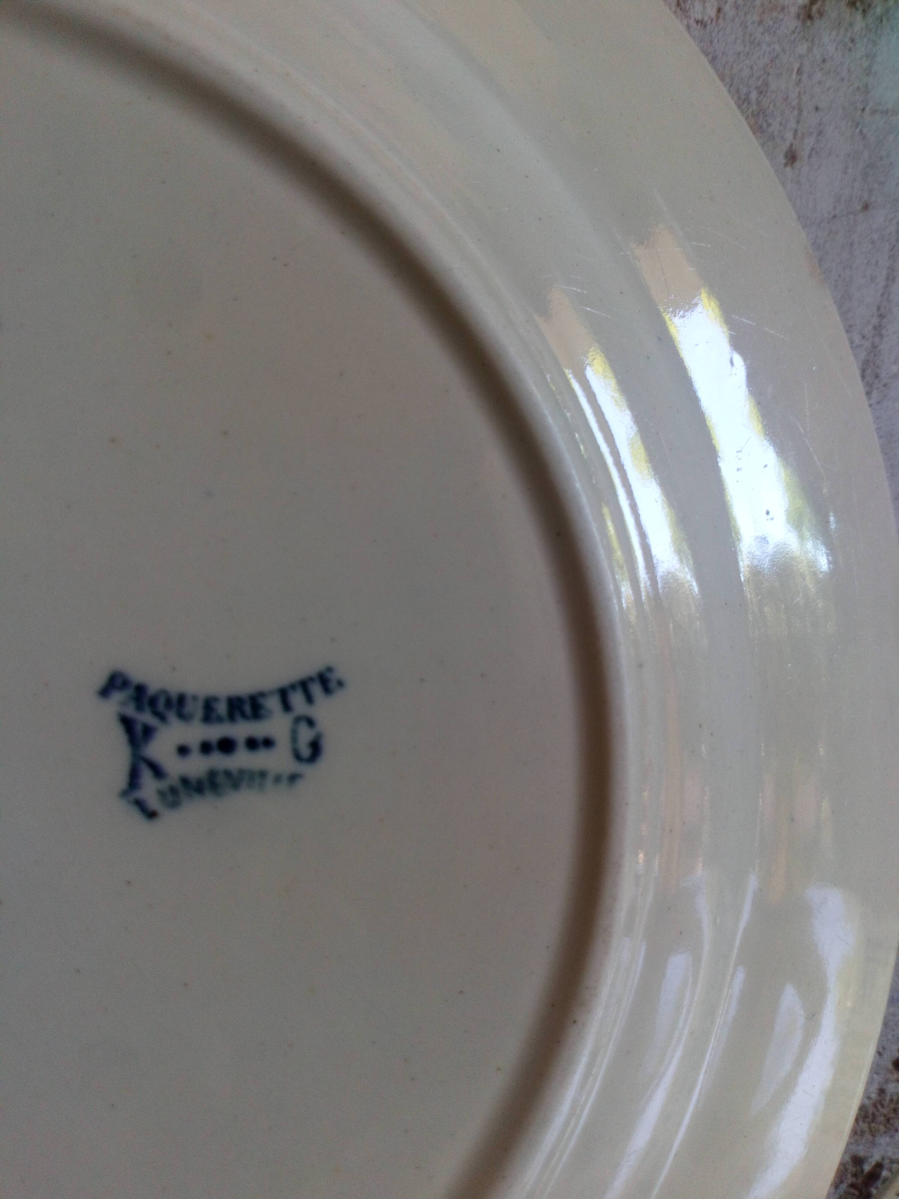 Six old plates made of lednéville iron soil from the "paquerette" sevice