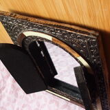 Vintage Moroccan mirror with chiseled pewter shutters