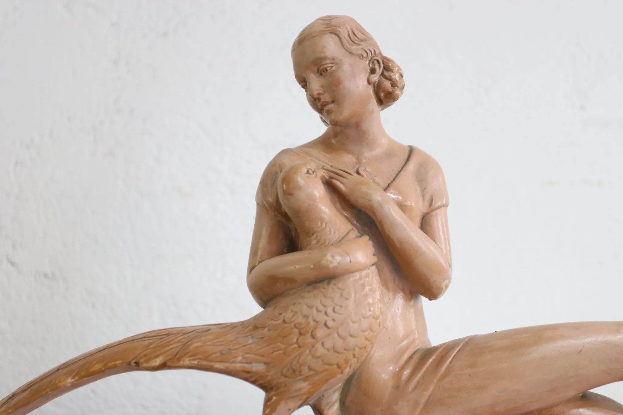 Salvatore Melani – Art Deco woman with pheasant, painted plaster, 1930s