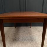 Scandinavian rectangular teak dining table with 4 tapered legs