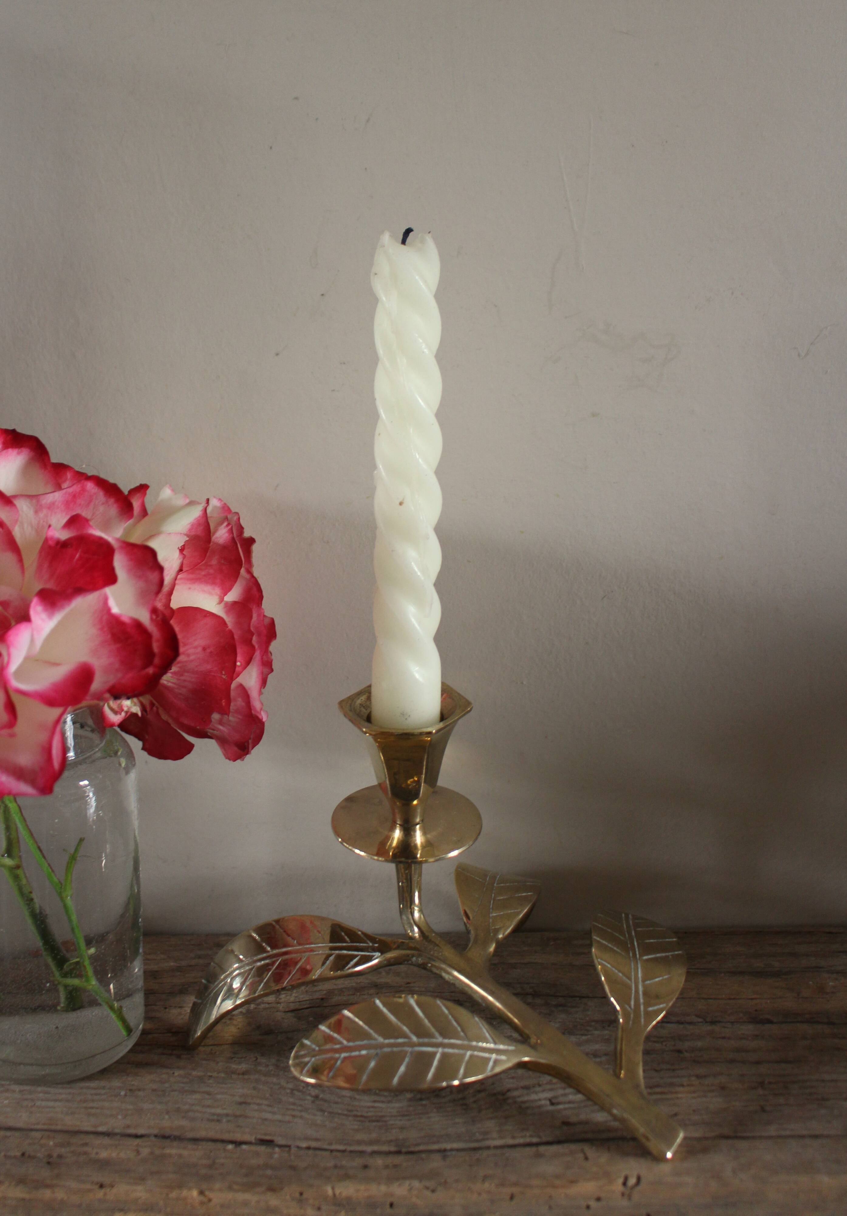 Brass candle holder with oval leaf branch