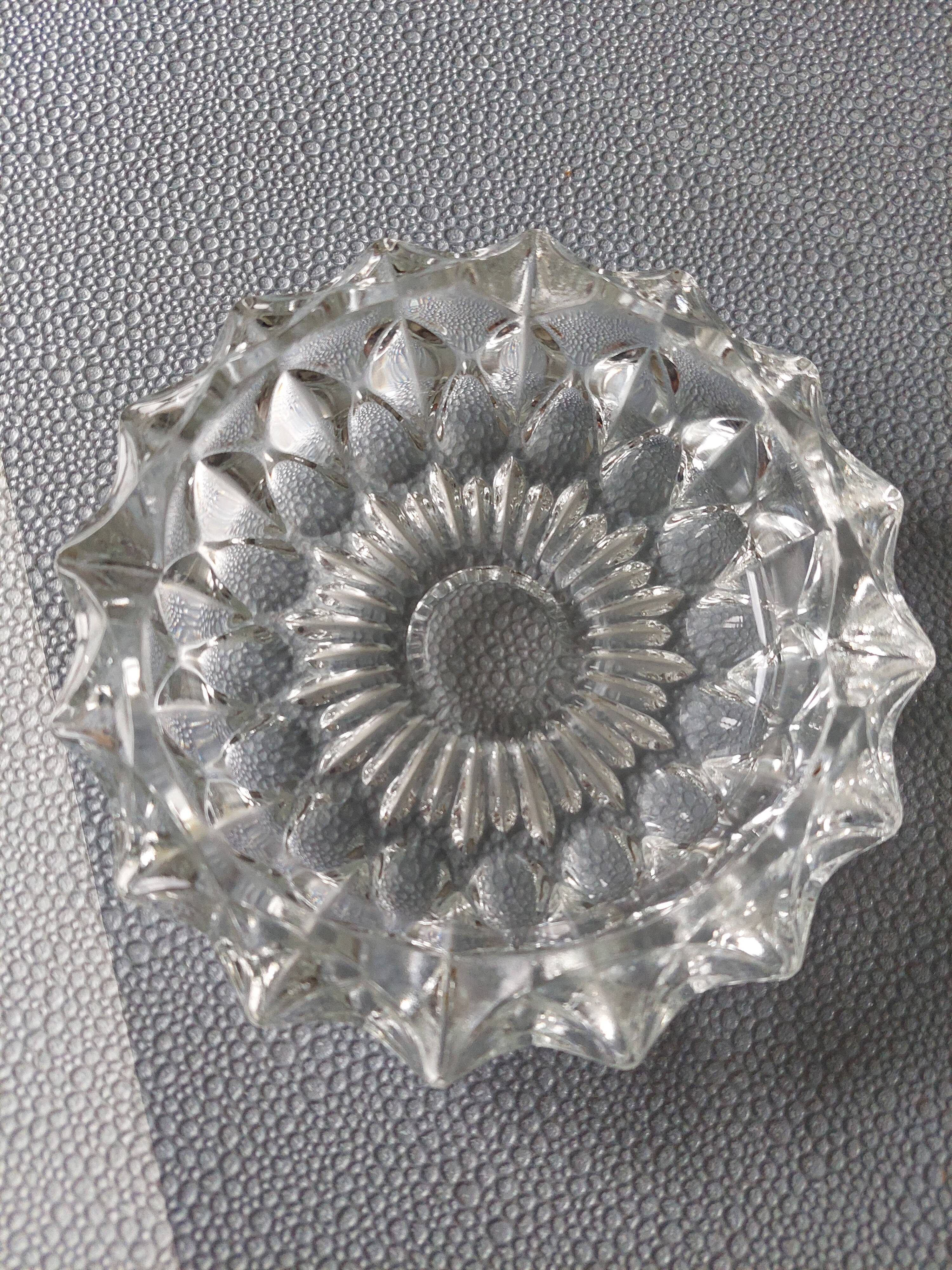 Empty ashtray molded glass pocket